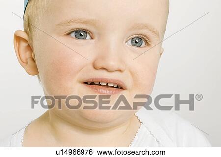 Close up of upset toddler View Large Photo Image Stock Photograph - Close up of upset toddler. Fotosearch