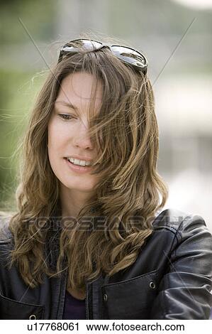 Stock Image - Close up of woman smiling. Fotosearch