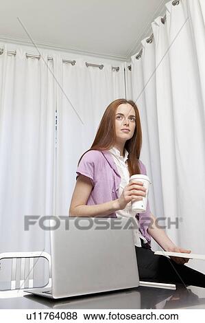 Coffee break at office View Large Photo Image Stock Photo - Coffee break at office. Fotosearch