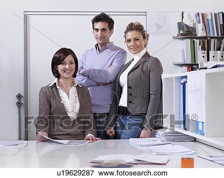 Stock Photo - Colleagues in Office. Fotosearch