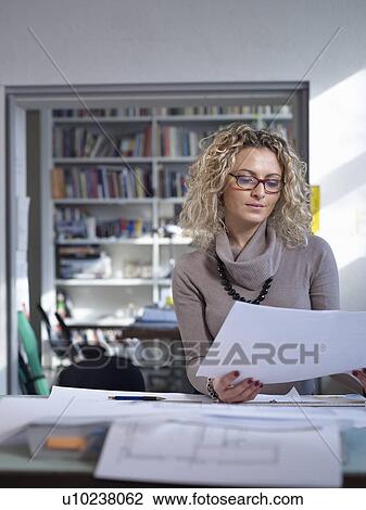 Concentration Female architect View Large Photo Image Stock Image - Concentration Female architect. Fotosearch