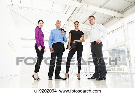 Confident business team View Large Photo Image Picture - Confident business team. Fotosearch