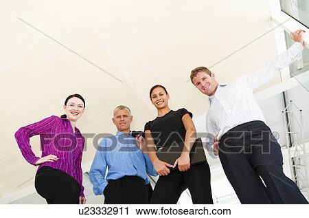 Stock Image - Confident business team. Fotosearch
