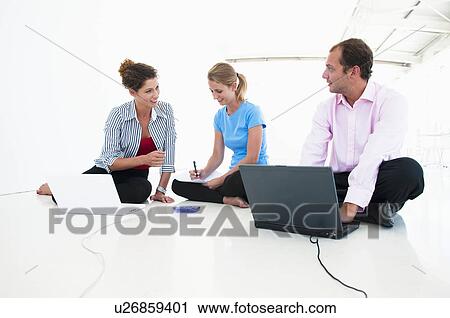 Stock Image - Confident business team. Fotosearch