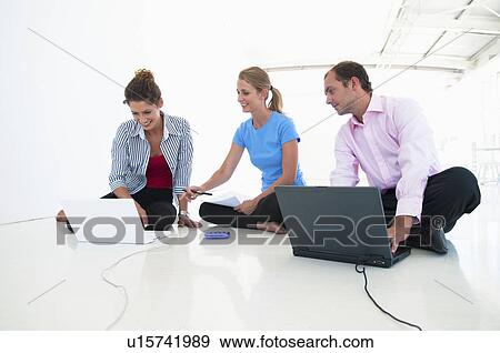 Stock Photo - Confident business team. Fotosearch