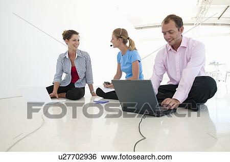 Confident business team View Large Photo Image Stock Photograph - Confident business team. Fotosearch