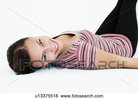 Confident relaxed woman View Large Photo Image Stock Photo - Confident relaxed woman. Fotosearch