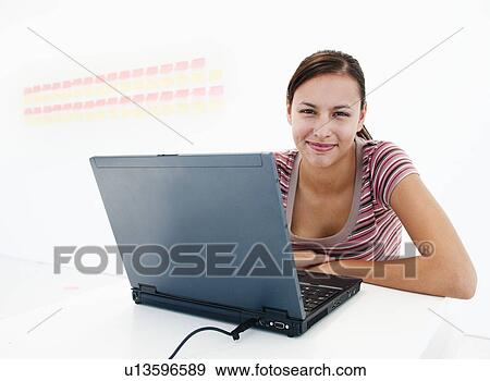 Confident woman in bright office View Large Photo Image Stock Photo - Confident woman in bright office. Fotosearch