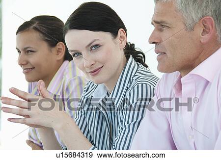 Confident woman in meeting View Large Photo Image Stock Photo - Confident woman in meeting. Fotosearch