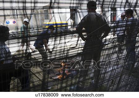 Construction men working View Large Photo Image Stock Photo - Construction men working. Fotosearch
