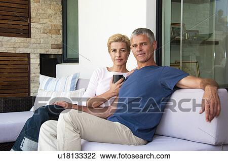 Couple at home View Large Photo Image Stock Image - Couple at home. Fotosearch
