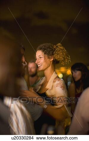 Couple dancing at party at night View Large Photo Image Picture - Couple dancing at party at night. Fotosearch