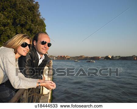 Couple enjoying the beauty of Venice View Large Photo Image Stock Image - Couple enjoying the beauty of Venice. Fotosearch