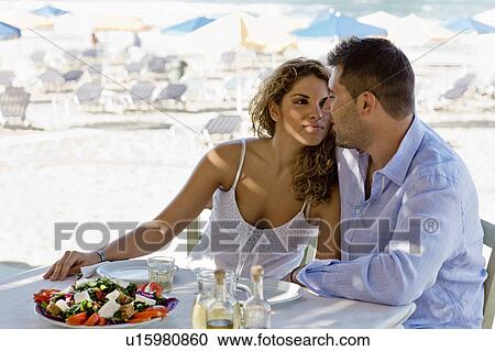 couple having lunch near the beach View Large Photo Image Stock Image - couple having lunch near the beach. Fotosearch