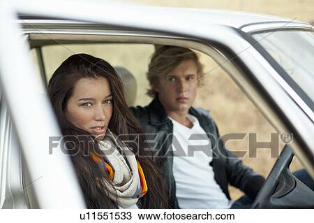 Stock Image - Couple in the car. Fotosearch