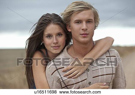 Stock Photo - Couple looking in camera. Fotosearch
