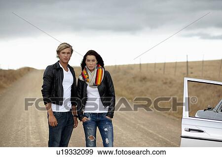 Couple on the street View Large Photo Image Stock Photo - Couple on the street. Fotosearch