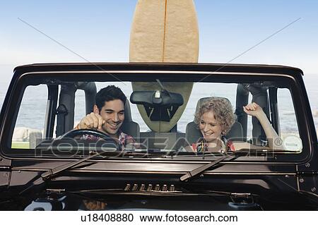 Couple riding in jeep together View Large Photo Image Stock Image - Couple riding in jeep together. Fotosearch