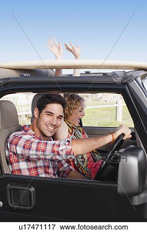 Couple riding in jeep together View Large Photo Image Stock Photo - Couple riding in jeep together. Fotosearch