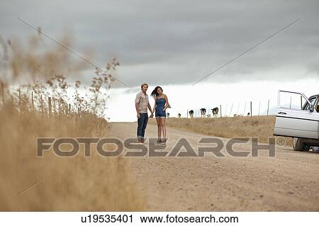 Stock Image - Couple waiting. Fotosearch