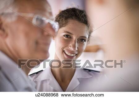 Crew of a ship talking View Large Photo Image Stock Photo - Crew of a ship talking. Fotosearch