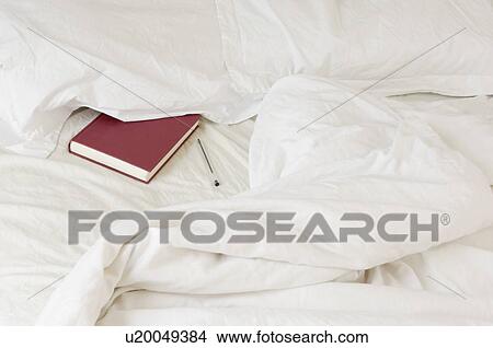 diary tucked under pillow View Large Photo Image Picture - diary tucked under pillow. Fotosearch