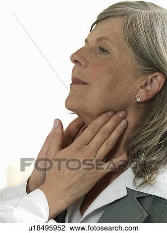 Doctor examining mature woman View Large Photo Image Stock Image - Doctor examining mature woman. Fotosearch