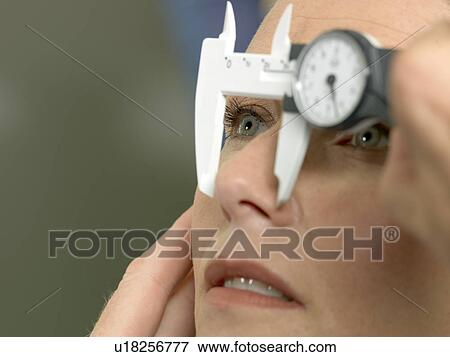 Doctor preparing patient for surgery View Large Photo Image Stock Photo - Doctor preparing patient for surgery. Fotosearch