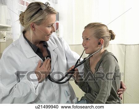 Stock Image - Doctor with girl. Fotosearch