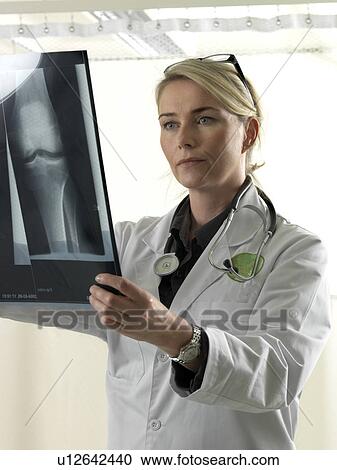 Doctor with x-ray View Large Photo Image Stock Image - Doctor with x-ray. Fotosearch