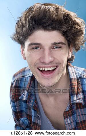 Energetic smile young man portrait View Large Photo Image Stock Photo - Energetic smile young man portrait. Fotosearch