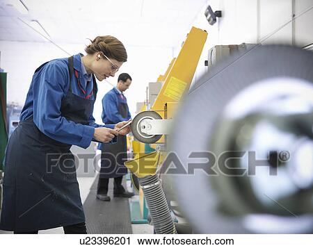 Engineers with polishing tools View Large Photo Image Stock Image - Engineers with polishing tools. Fotosearch