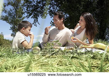 Family having a picnic View Large Photo Image Stock Photography - Family having a picnic. Fotosearch
