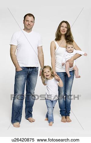 Family standing together View Large Photo Image Stock Photography - Family standing together. Fotosearch