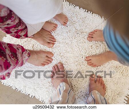 Family’s feet on bath mat View Large Photo Image Stock Image - Family’s feet on bath mat. Fotosearch