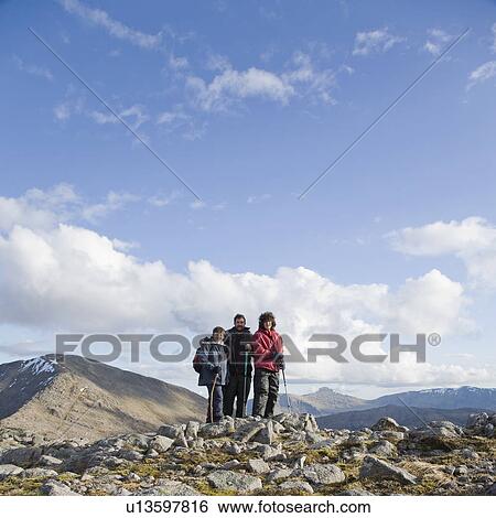 Father & Sons on Summit of mountain View Large Photo Image Stock Photograph - Father & Sons on Summit of mountain. Fotosearch