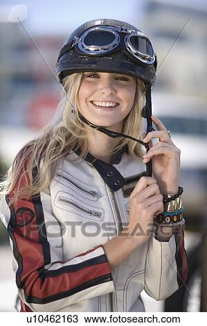 Female biker View Large Photo Image Stock Image - Female biker. Fotosearch