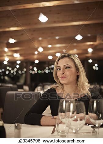 Female Business woman in restaurant View Large Photo Image Stock Photograph - Female Business woman in restaurant. Fotosearch