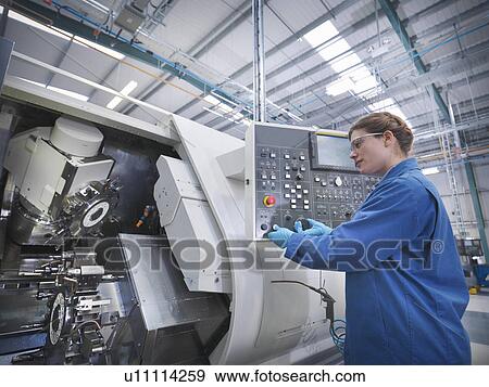 Female engineer with machinery View Large Photo Image Stock Photo - Female engineer with machinery. Fotosearch