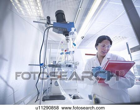 Stock Photo - Female scientist in laboratory. Fotosearch