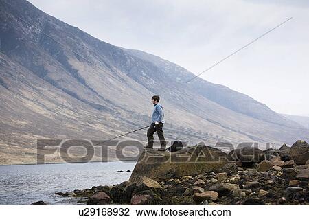 Stock Image - Fishing on the loch. Fotosearch