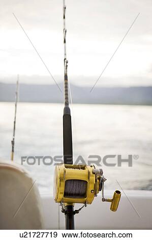 Fishing rod anchored on boat View Large Photo Image Stock Photo - Fishing rod anchored on boat. Fotosearch