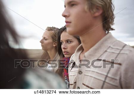Four friends looking out View Large Photo Image Picture - Four friends looking out. Fotosearch