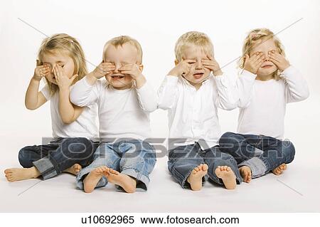 Four toddlers covering their eyes View Large Photo Image Stock Photography - Four toddlers covering their eyes. Fotosearch
