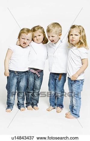 Stock Photo - Four toddlers hugging. Fotosearch