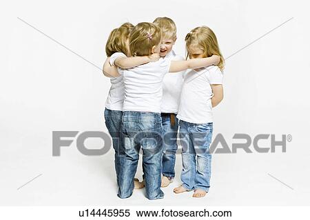 Four toddlers hugging View Large Photo Image Stock Photography - Four toddlers hugging. Fotosearch