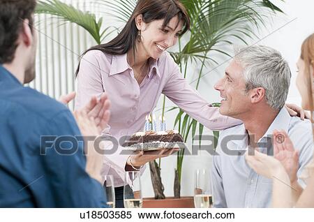 Friends celebrating birthday together View Large Photo Image Stock Photography - Friends celebrating birthday together. Fotosearch