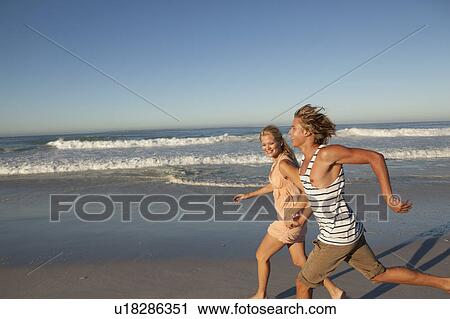 Girl and Boy running View Large Photo Image Stock Image - Girl and Boy running. Fotosearch