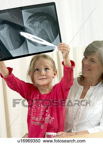 Girl and grandmother with x-ray View Large Photo Image Stock Image - Girl and grandmother with x-ray. Fotosearch