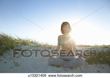 Girl doing yoga View Large Photo Image Stock Photo - Girl doing yoga. Fotosearch